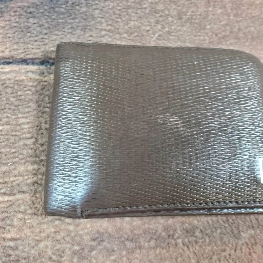 Tumi bifold wallet